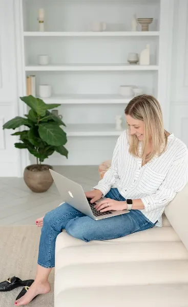 Photo of woman on a laptop.