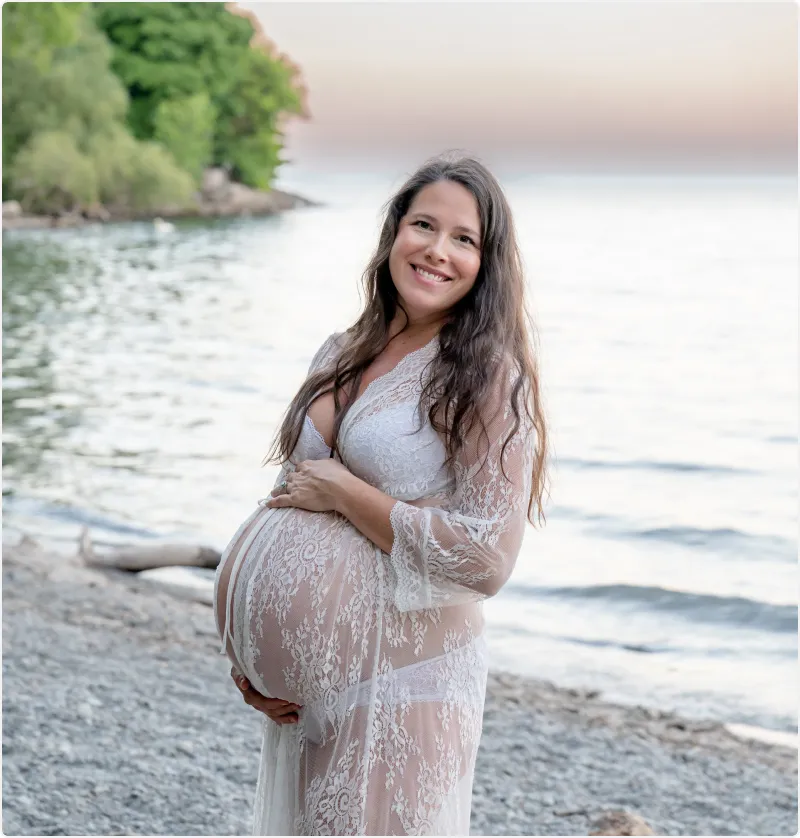 Pregnant woman on beach