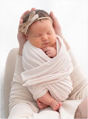 Newborn Baby in Sling
